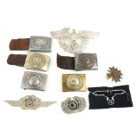 A COLLECTION OF WWI AND WWII GERMAN ARMY BELT BUCKLES AND INSIGNIA To include a buckle, inscribed '
