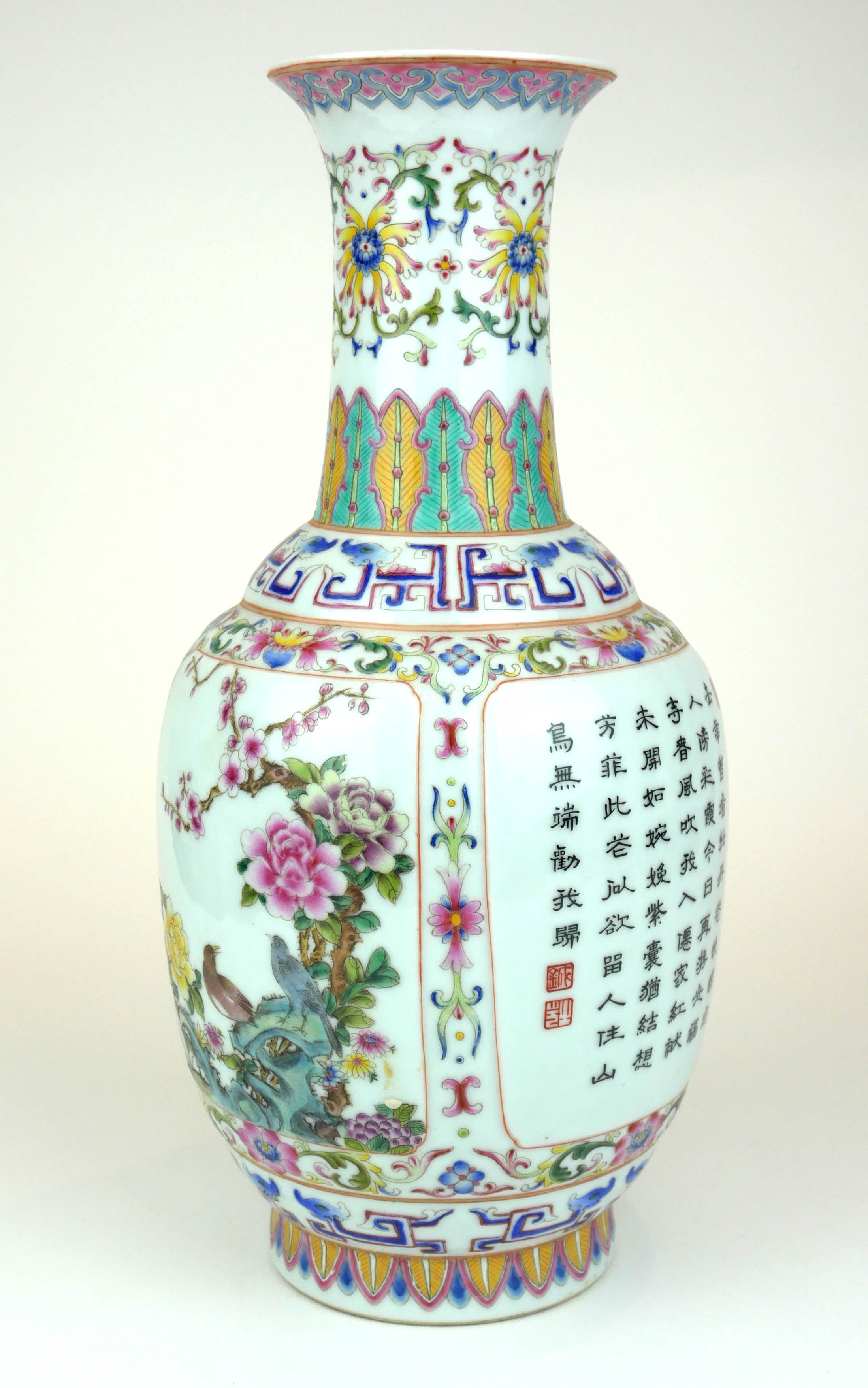 A 20TH CENTURY CHINESE PORCELAIN BALUSTER VASE Brightly decorated in coloured enamels flora and