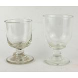 TWO GEORGIAN SPHERICAL RUMMER GLASSES With pedestal base. (approx 15cm)