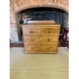 A VICTORIAN PINE CHEST Of two short above two long drawers, standing on bun feet. (100cm x 50cm x