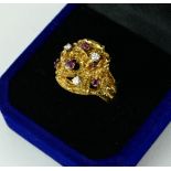 AN 18CT GOLD, RUBY AND DIAMOND RING, CIRCA 1960 (size K½).