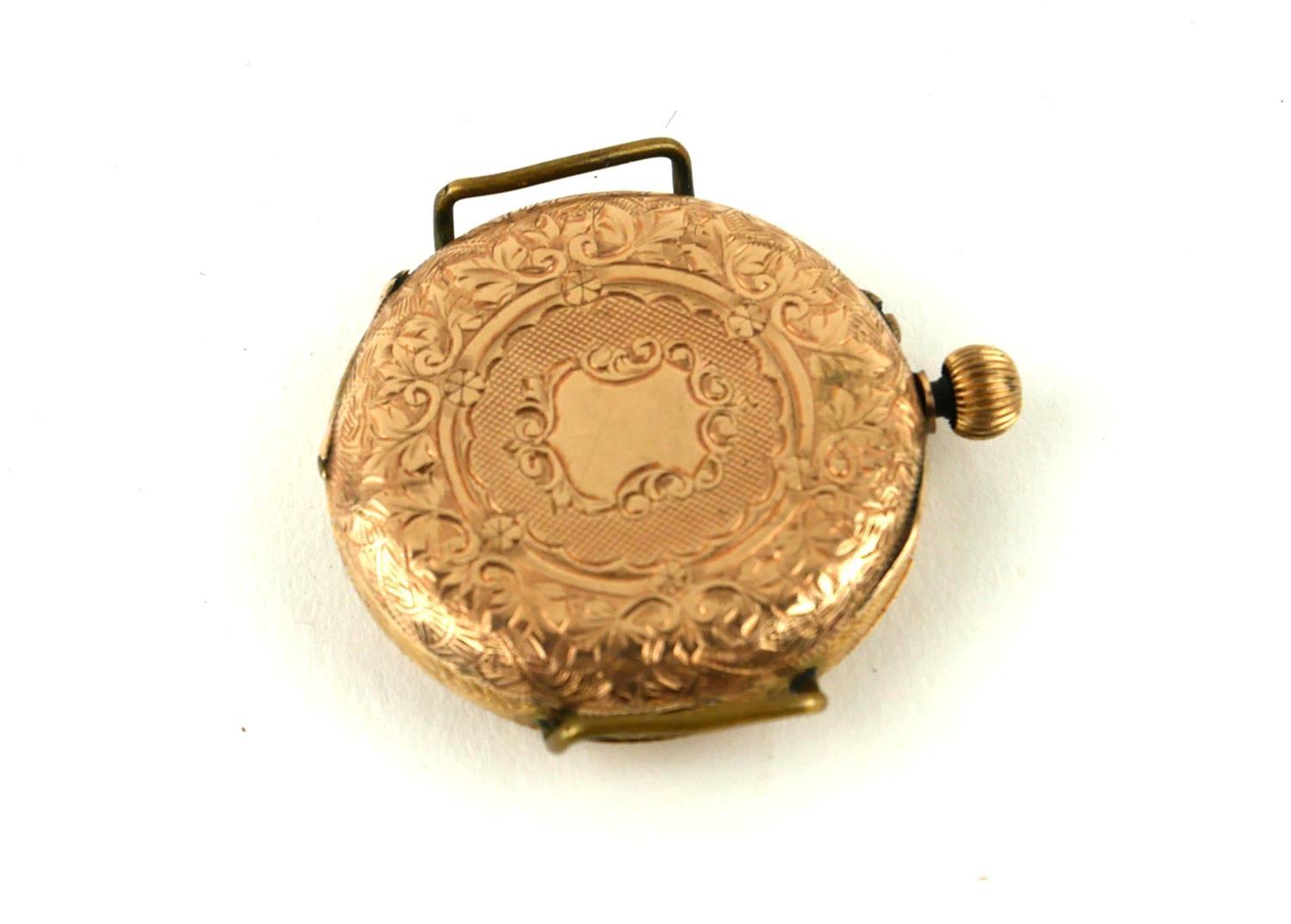 AN EARLY 20TH CENTURY 14CT GOLD WRISTWATCH Having an engraved outer case, dial and manual wind. ( - Image 2 of 2