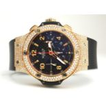 HUBLOT, BIG BANG, AN 18CT GOLD AND DIAMOND GENT'S CHRONOGRAPH WRISTWATCH With textured black dial,