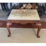 AN ANTIQUE MAHOGANY STOOL With tapestry upholstered drop in seat, cabriole legs on pad feet.