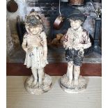 A PAIR OF EARLY 20TH CENTURY PLASTER STATUES BOY AND GIRL IN TRADITIONAL DRESS. (80cm)