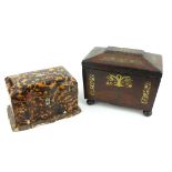 A VICTORIAN TORTOISESHELL AND IVORY TEA CADDY Having a serpentine front and two compartments to