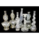 A COLLECTION OF LATE 19TH/EARLY 20TH CENTURY COMMEMORATIVE GLASS LIQUOR BOTTLES Including figural