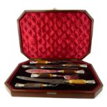 A CASED VICTORIAN SILVER PLATE AND HORN CARVING SET Seven piece set with silver caps, hallmarked