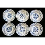 MEISSEN, A SET OF SIX LATE 19TH/EARLY 20TH CENTURY PORCELAIN BLUE AND WHITE PLATES Having pierced