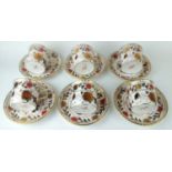 ROYAL CROWN DERBY, A SET OF SIX ASIAN ROSE PATTERNED COFFEE CANS AND SAUCERS. Condition: good