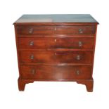 A 19TH CENTURY MAHOGANY CHEST OF FOUR LONG GRADUATED DRAWERS Of small proportions, raised on bracket