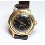 ROLEX, OYSTER PERPETUAL, A VINTAGE 9CT GOLD GENT'S WRISTWATCH Having a black tone dial, subsidiary