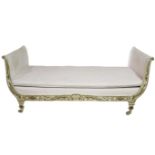 A DECORATIVE 19TH CENTURY FRENCH CAST IRON PAINTED DAYBED With scrolling ends and decorated with