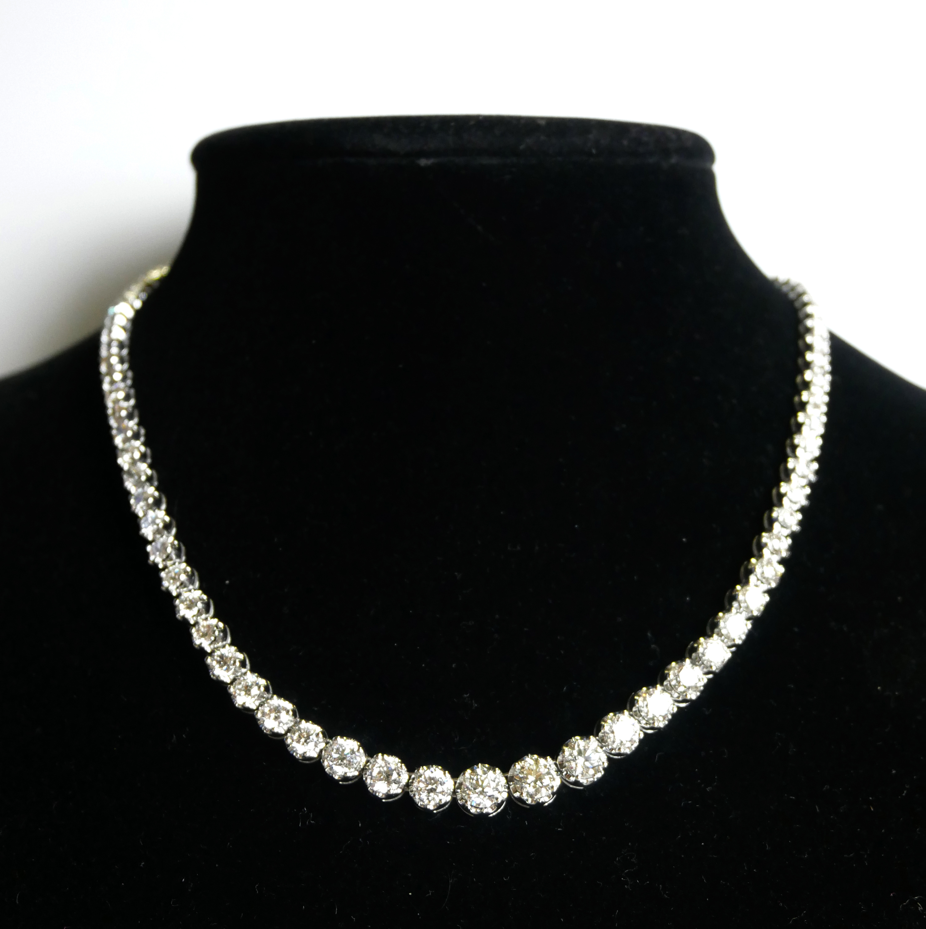 AN 18CT WHITE GOLD AND GRADUATED ROUND BRILLIANT CUT DIAMOND ETERNITY NECKLACE. (approx diamond - Image 2 of 2