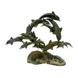 A MID 20TH CENTURY BRONZE GROUP, DIVING DOLPHINS Raised on a scrolling sea base. (h 48.5cm x d