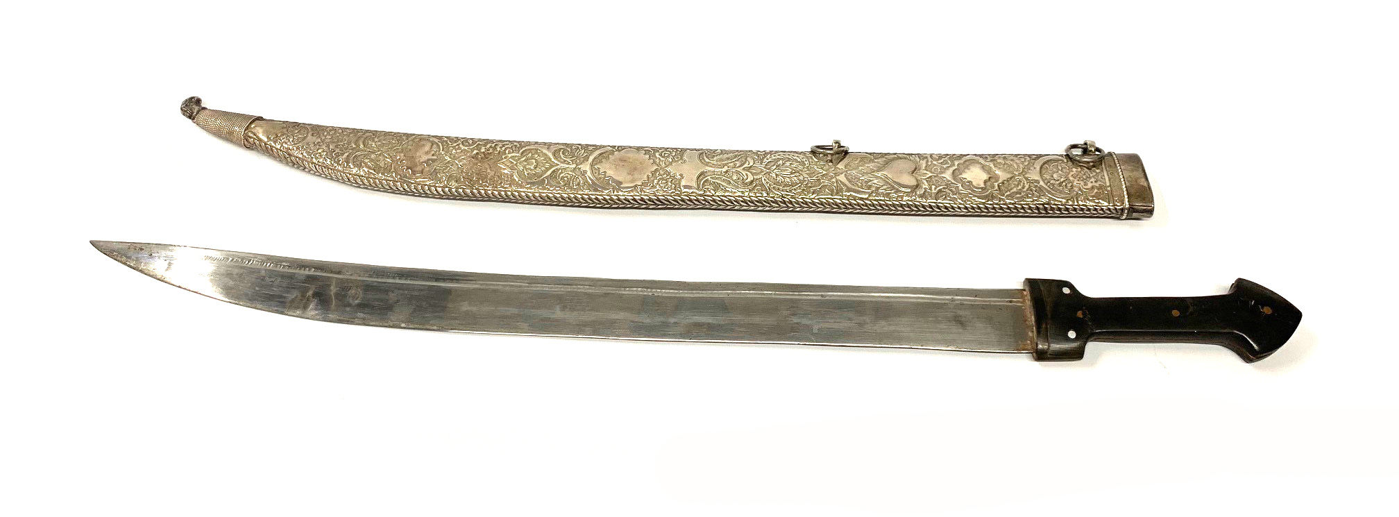 A 19TH CENTURY OTTOMAN SWORD With horn handle and silver embossed hilt. (length of blade 59cm,