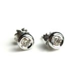 A PAIR OF 18CT WHITE GOLD AND STUD EARRINGS. (approx diamond weight .46ct) Condition: good