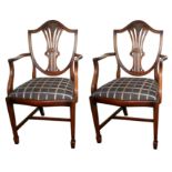 A PAIR OF REGENCY STYLE MAHOGANY OPEN ARMCHAIRS, With pierced wheatsheaf shield backs upholstered