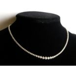 AN 18CT WHITE GOLD AND BRILLIANT CUT DIAMOND ETERNITY NECKLACES. (approx diamond 6ct, 41cm)