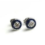 A PAIR OF 18CT WHITE GOLD, DIAMOND AND SAPPHIRE STUD EARRINGS Condition: good