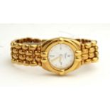 CHOPARD, AN 18CT GOLD LADIES' BRACELET WATCH. (83.2g)