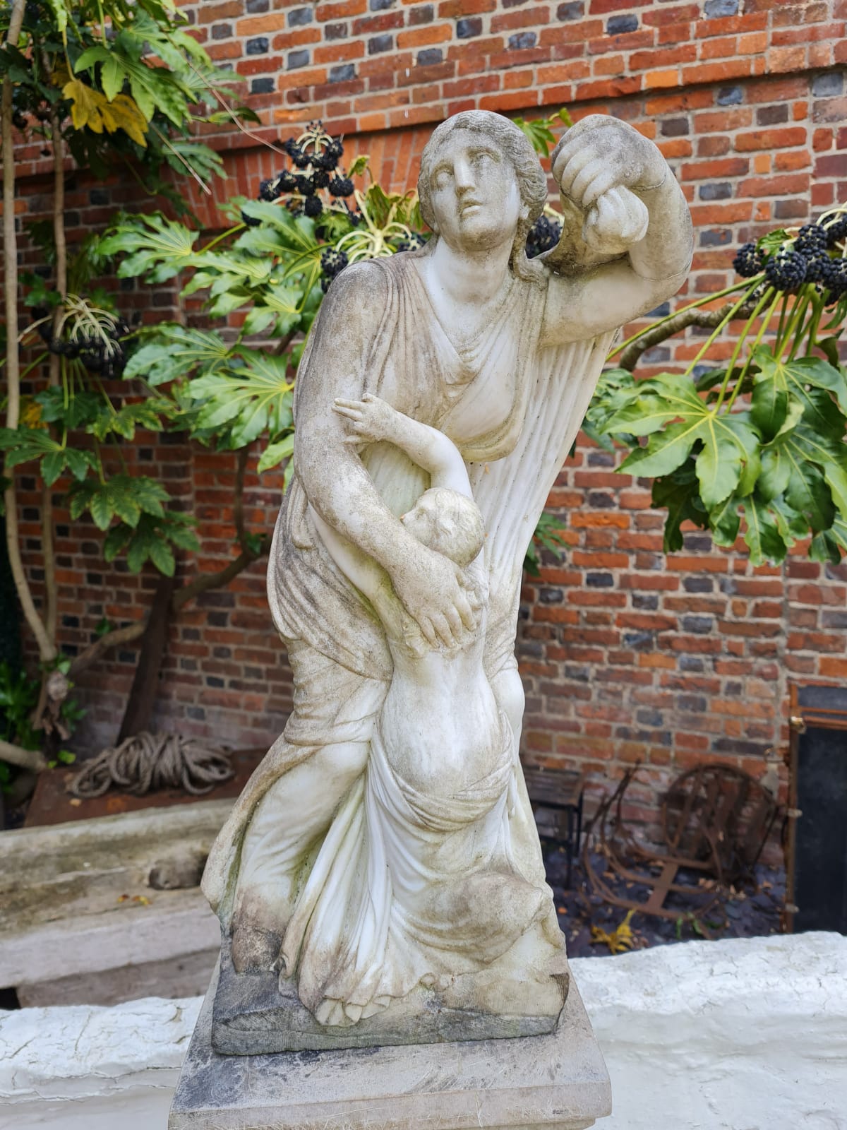 A 19TH CENTURY MARBLE STATUE, SAINTLY FIGURE WITH CHILD On a tapering pedestal. (25cm x 25cm x - Image 2 of 3