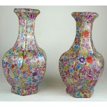 A PAIR OF CHINESE PORCELAIN FLORAL VASES Decorated with multi flowers on yellow ground with jade