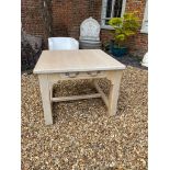 A 20TH CENTURY LIMED OAK PREPARATION TABLE The single drawer raised on heavy square chamfered legs