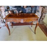 A 19TH CENTURY FRENCH BURR AND FIGURED WALNUT MARQUETRY INLAID CENTRE TABLE With ogee top above