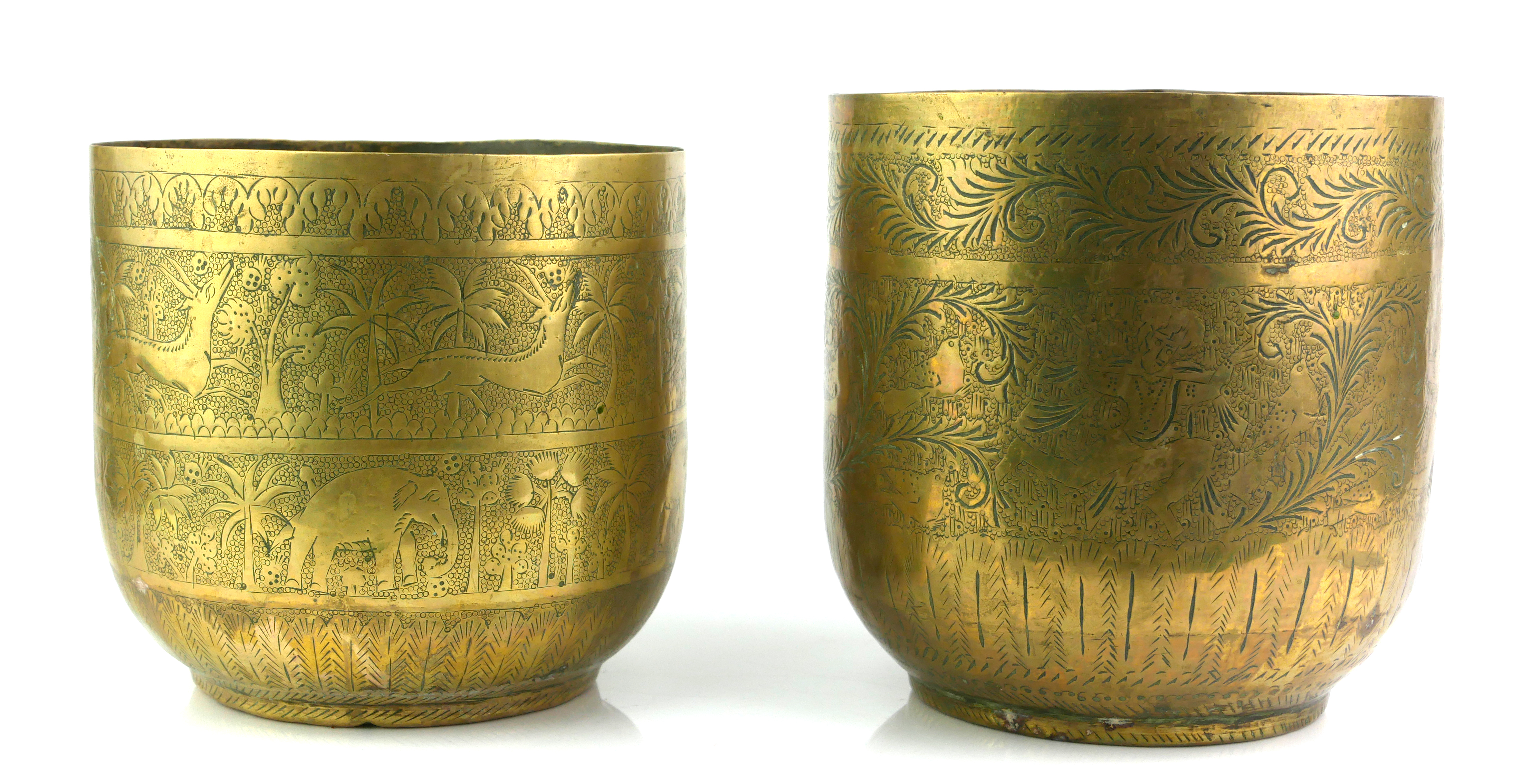 A PAIR OF INDIAN BRASS JARDINIERES Having fine engraved decoration of hunting figures with exotic