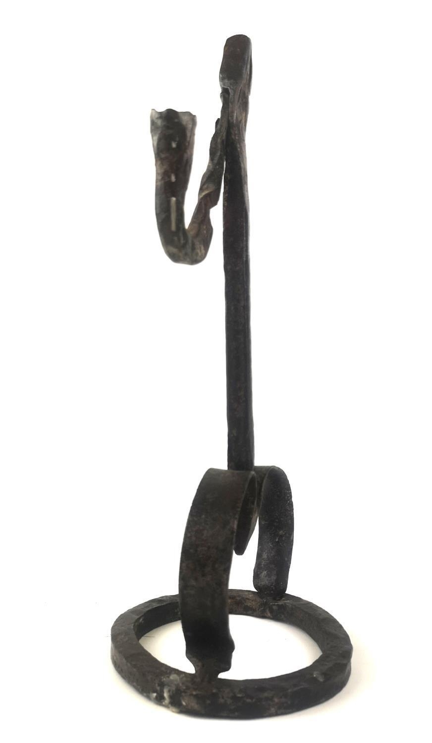 A SUBSTANTIAL ANTIQUE WROUGHT IRON RUSHLIGHT Square column, two splayed legs, on circular base. ( - Image 2 of 3