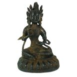 A CHINESE BRONZE FEMALE BUDDHA FIGURE Seated pose wearing an elaborate headdress and six character