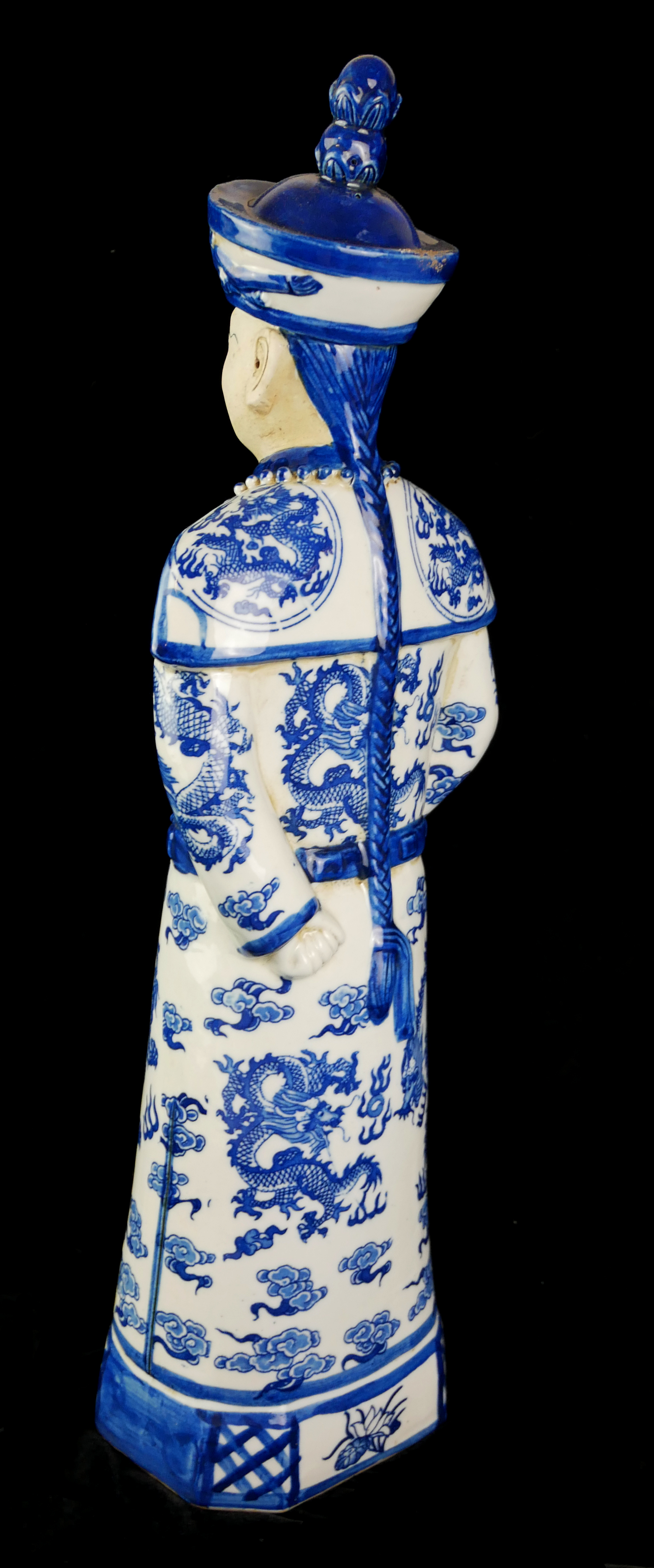 A CHINESE BLUE AND WHITE PORCELAIN EMPEROR FIGURE Standing pose wearing a robe with opposing dragons - Image 2 of 3