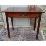 A GEORGIAN CUBAN MAHOGANY SIDE TABLE With a single drawer, raised on square tapering legs. (84cm x