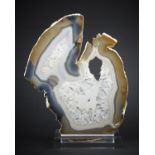 AN AGATE SLICE MOUNTED ON A CUSTOM ACRYLIC DISPLAY STAND, BRAZIL (h 33cm x w 24.5cm x d 7cm).