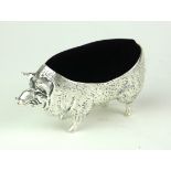 A CONTINENTAL SILVER PIG NOVELTY PIN CUSHION Standing pose with red velvet cushion, marked '.