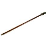 A BRASS AND OAK WALKING CANE WITH TELESCOPE AND COMPASS The handle set with a glass compass, opening