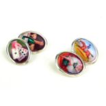 A PAIR OF SILVER AND ENAMEL NOVELTY GENT'S OVAL CUFFLINKS Decorated with the four vices featuring,