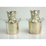 A PAIR OF SILVER PLATED 'CAT IN THE HAT' NOVELTY SALT AND PEPPER POTS A solitary cat in a top hat.