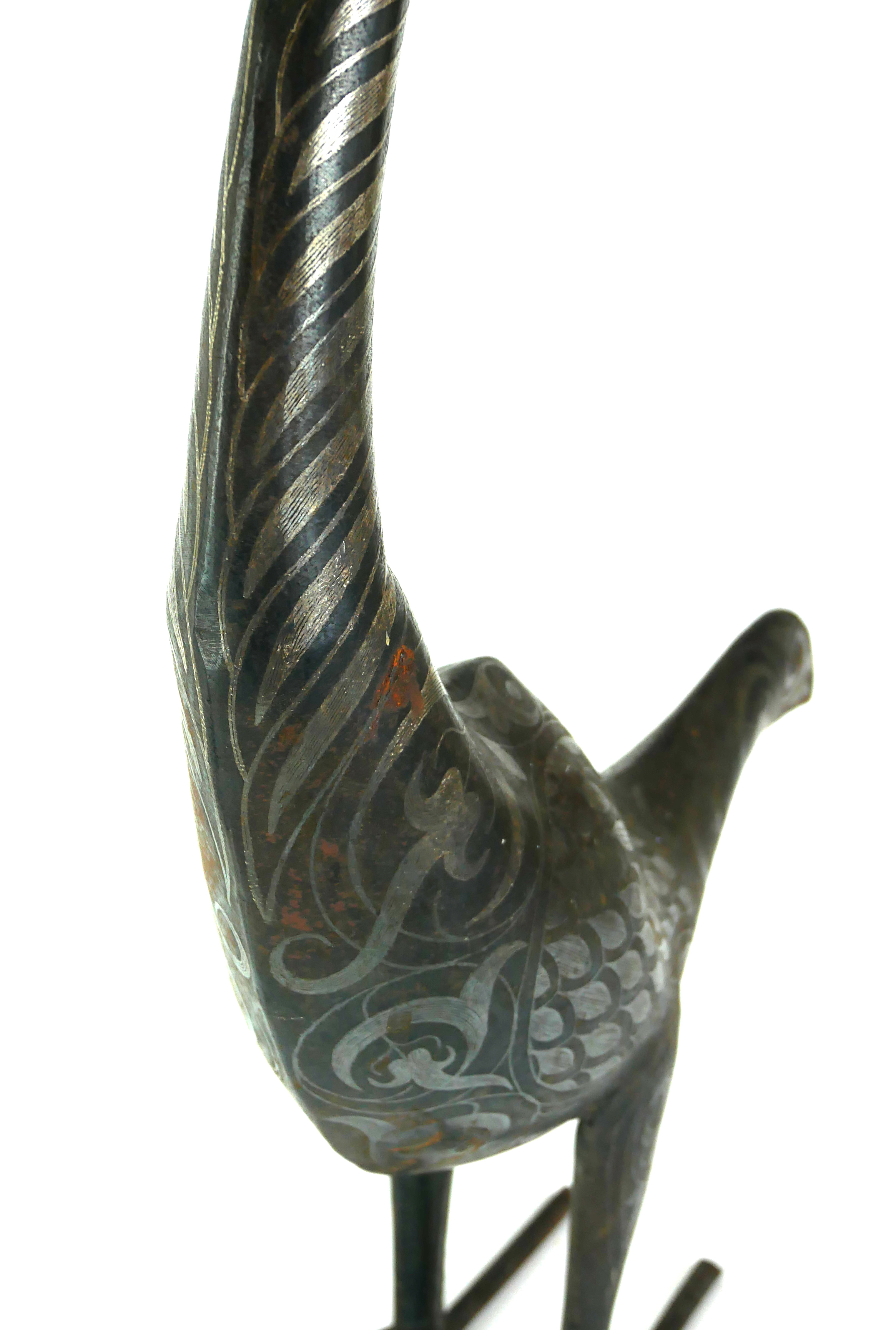 A PERSIAN STYLE METAL MODEL OF A PEACOCK Inlaid with white metal bands. (h 61cm) - Image 2 of 2