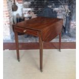 A GEORGIAN MAHOGANY PEMBROKE TABLE With real and false drawer, raised on square tapering legs with