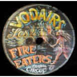 VODAIRS LES FIRE EATERS, A PAINTED FAIRGROUND ROUNDEL. (diameter 82cm)