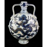 A 20TH CENTURY CHINESE BLUE AND WHITE PORCELAIN MOON FLASK Both sides decorated with Imperial dragon