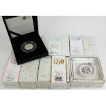 BEATRIX POTTER, A COLLECTION OF SEVEN COMMEMORATIVE SILVER AND ENAMEL FIFTY PENCE PIECE PROOF