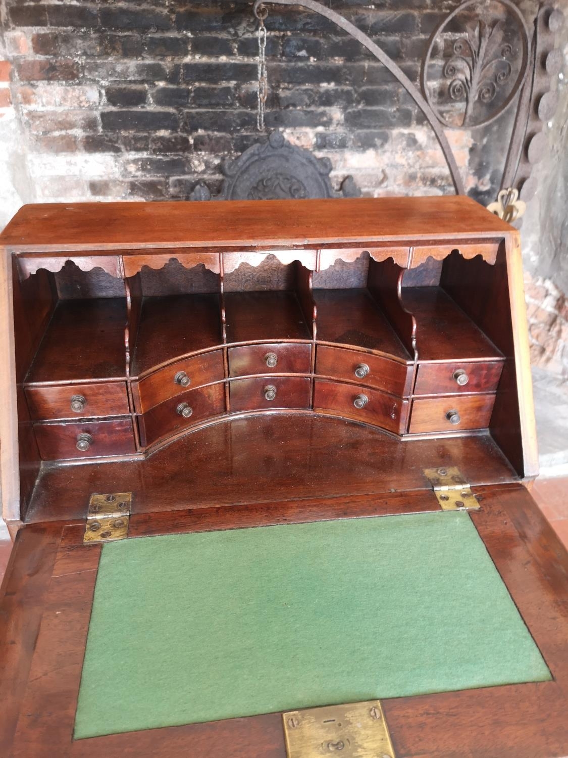 A GEORGIAN AND LATER CHILDS MAHOGANY WRITING BUREAU The fall front enclosing a fitted interior above - Image 4 of 4