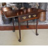 AN 18TH CENTURY CUBAN MAHOGANY DROP LEAF SIDE TABLE The single drawer fitted with brass handles