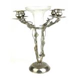 A MID 20TH CENTURY CONTINENTAL SILVER PLATED FOUR LIGHT TABLE CANDELABRA Applied with vine leaves,