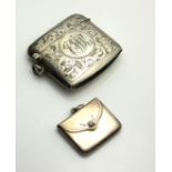 AN EARLY 20TH CENTURY SILVER VESTA CASE AND POSTAGE STAMP CASE Rectangular form, with engraved