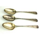 A COLLECTION OF THREE GEORGIAN SILVER TABLESPOONS Plain form with engraved squirrel family crest,