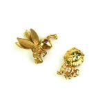 TWO 9CT GOLD DIAMOND AND GEM SET NOVELTY BROOCHES Honey bee with ruby set eyes and a lion set with